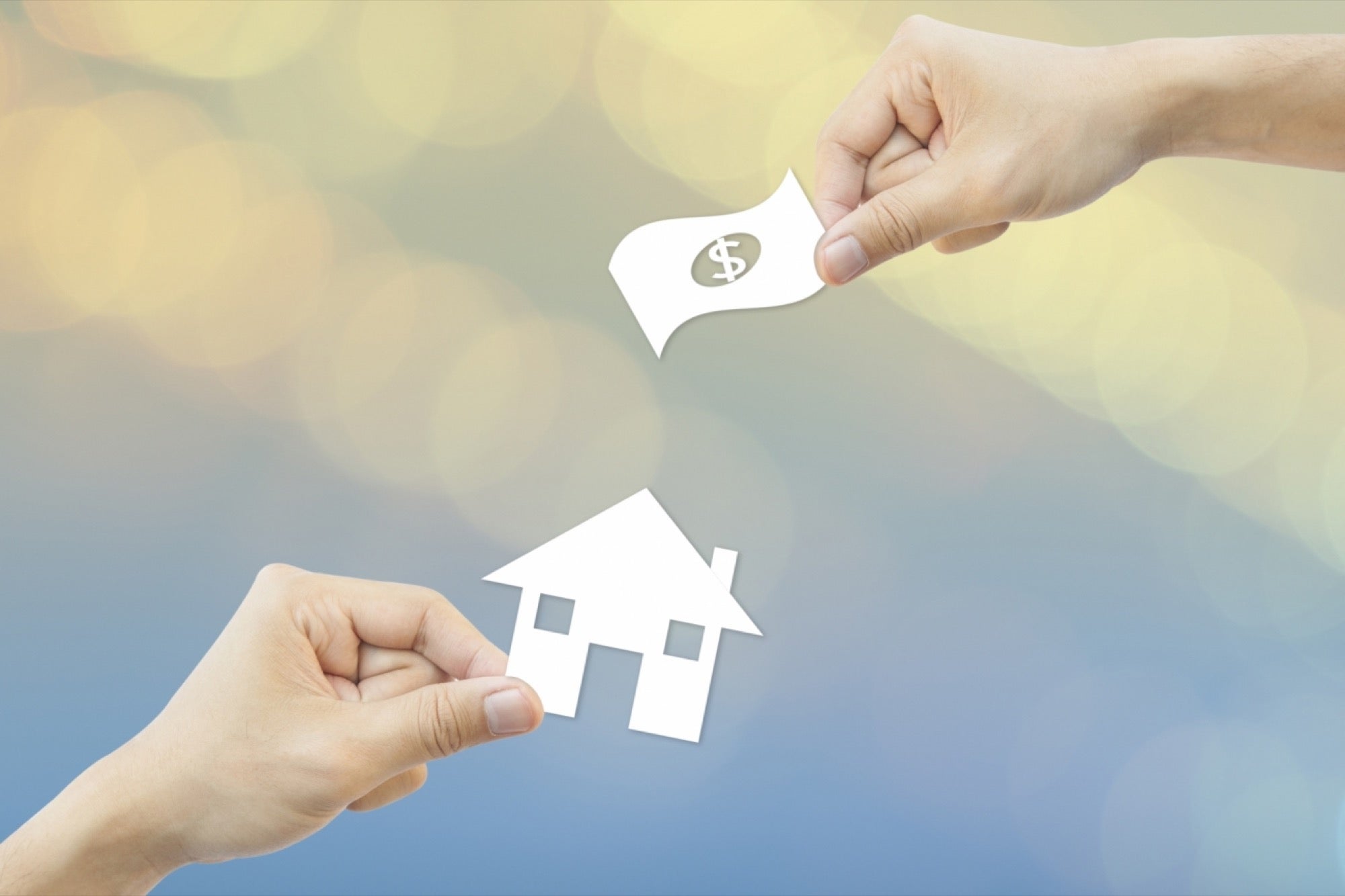 20170731115918-business-concept-hand-hold-white-paper-house-and-money-bokeh-background-sv3m1o2fg